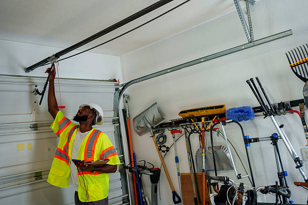 Professional Garage Door Panel Replacement technician working in Duryea, PA